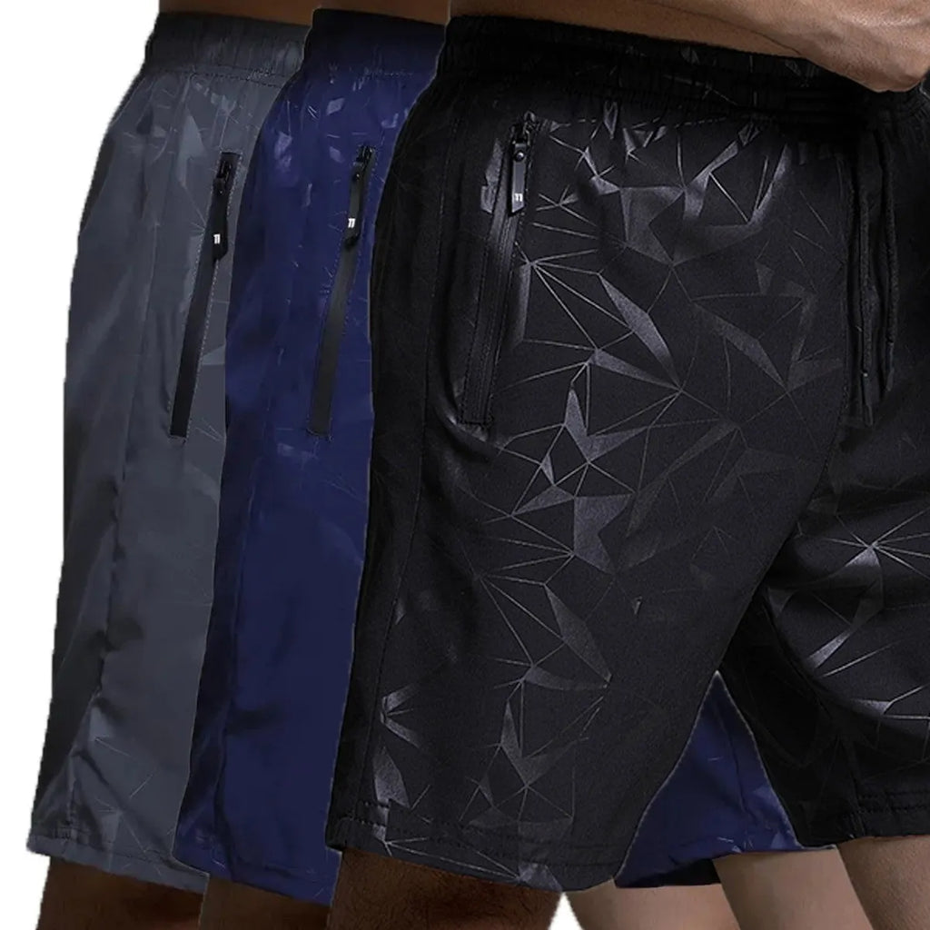 Man wearing loose black polyester sports shorts with an elastic waistband, suitable for gym or casual wear.