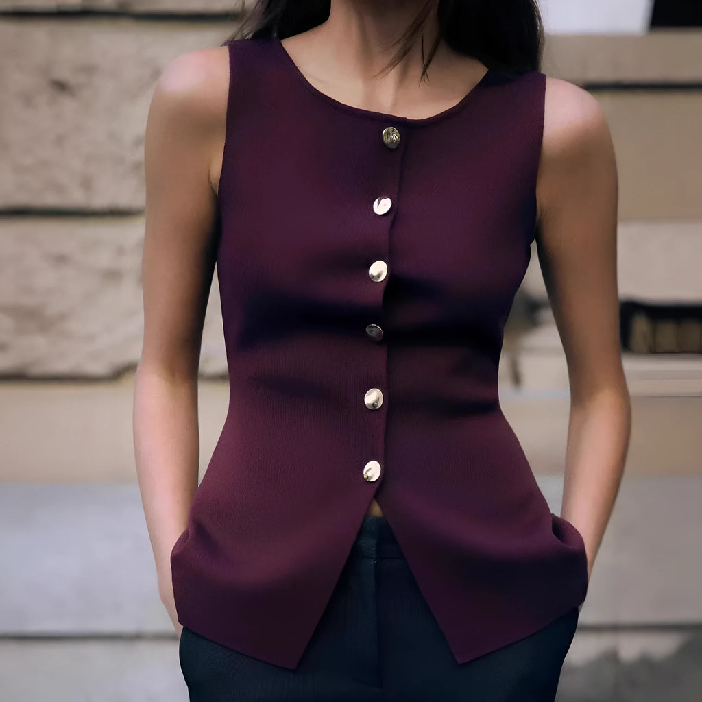 Dark red slim fit sweater vest with gold buttons and a raised 3D pattern, laid flat.