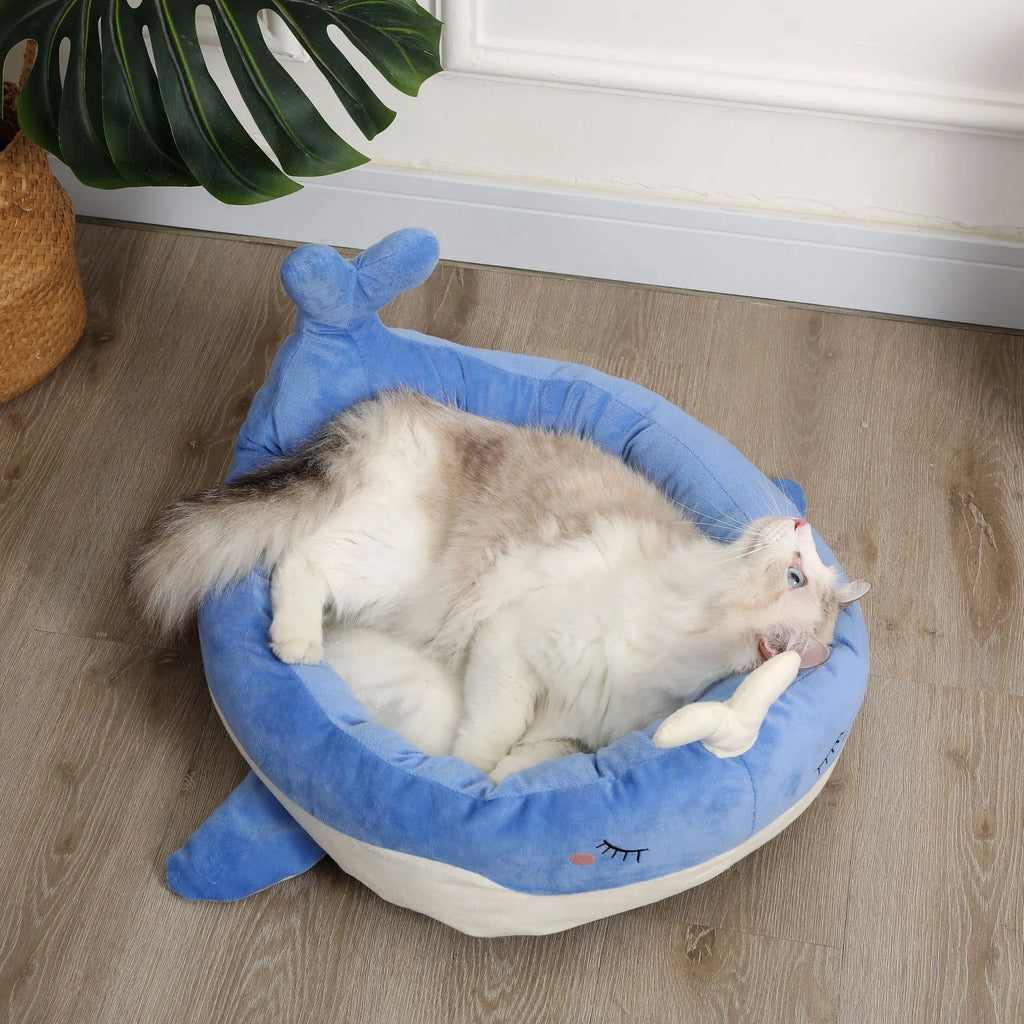 Blue duck-shaped fluffy pet bed for small dogs and cats on a floor