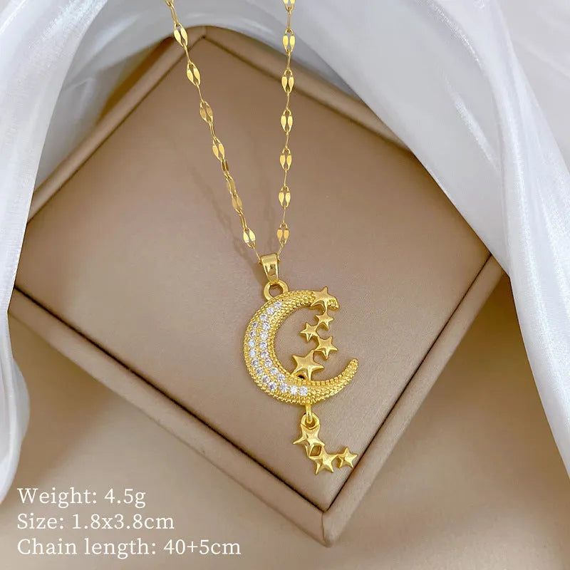 Moon pendant necklace with tassel details on stainless steel chain