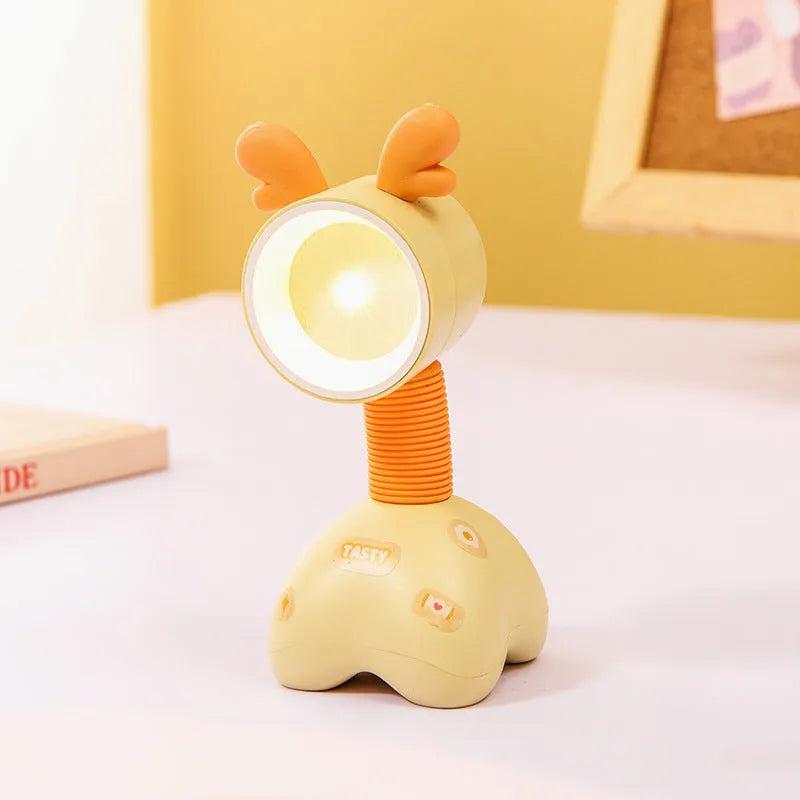 DIY cartoon magnetic small night lamp in assorted animal styles and colours on a desktop.
