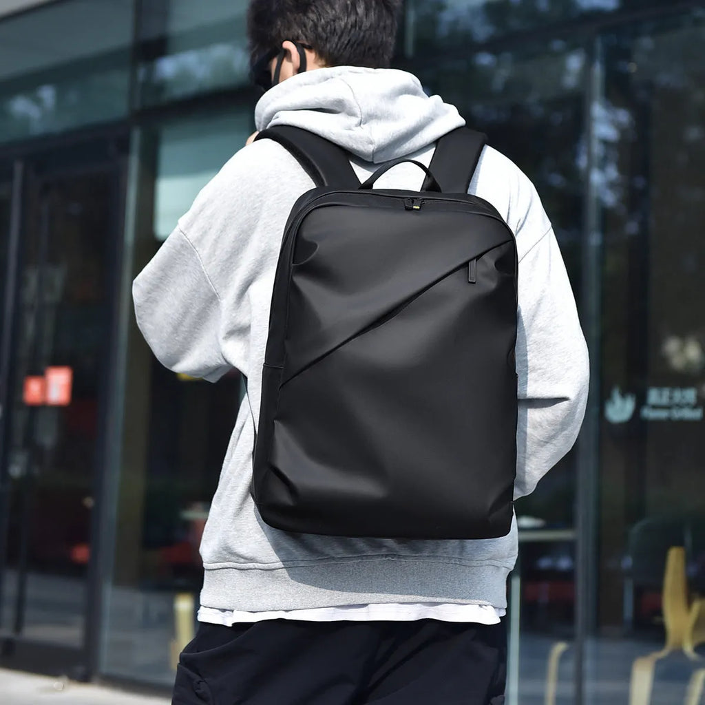 Large capacity waterproof backpack for men in simple design with PU leather construction