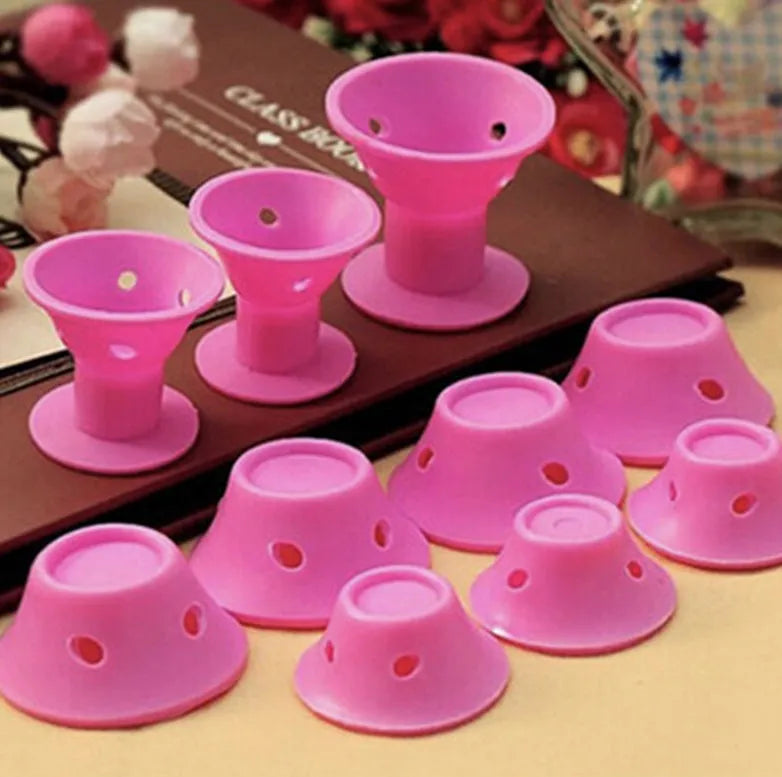 Set of ten soft silicone hair rollers in pink, blue, purple, and black, large 5cm and small 3.9cm diameter