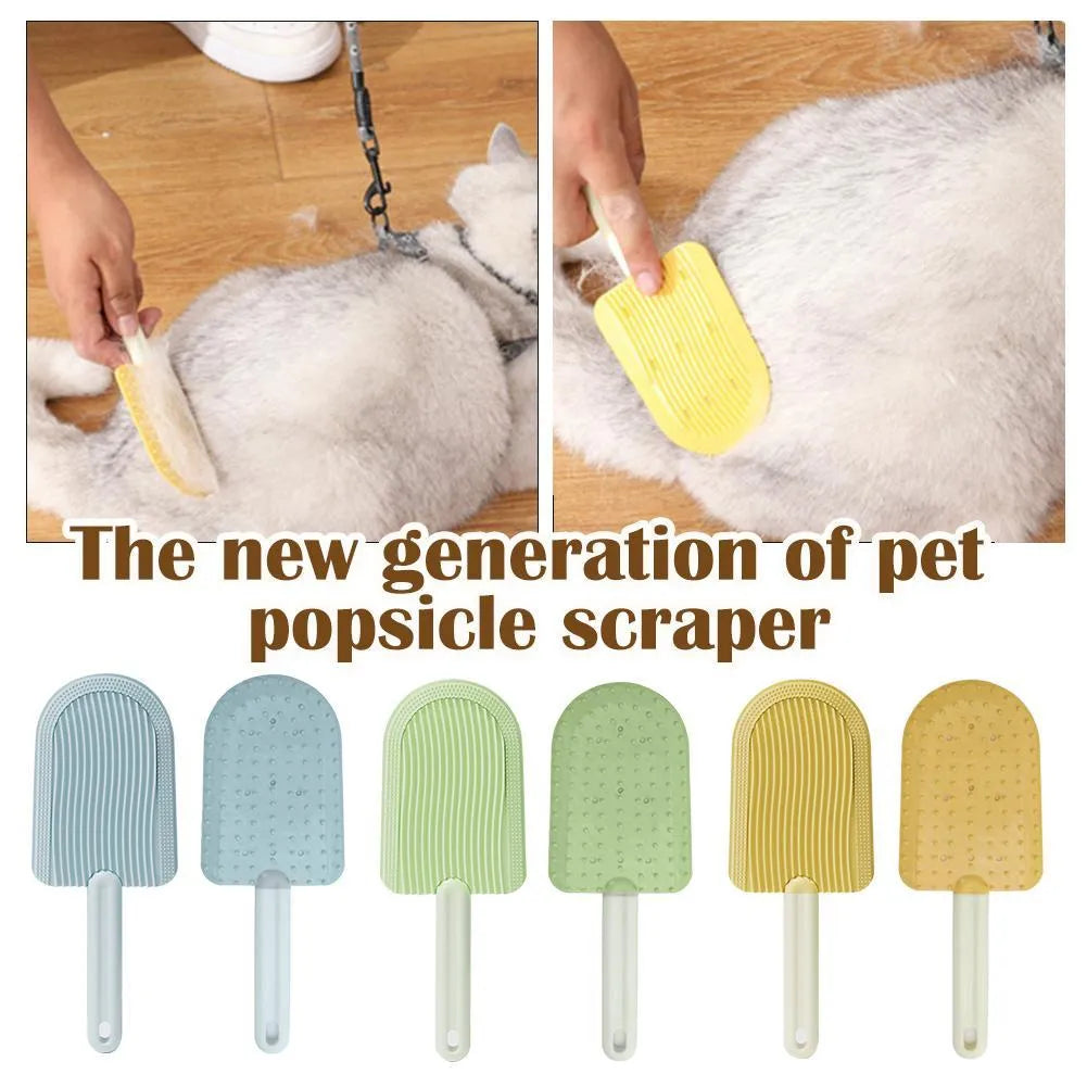 Soft silicone foldable pet hair brush in green, blue and yellow, used for grooming cats and dogs