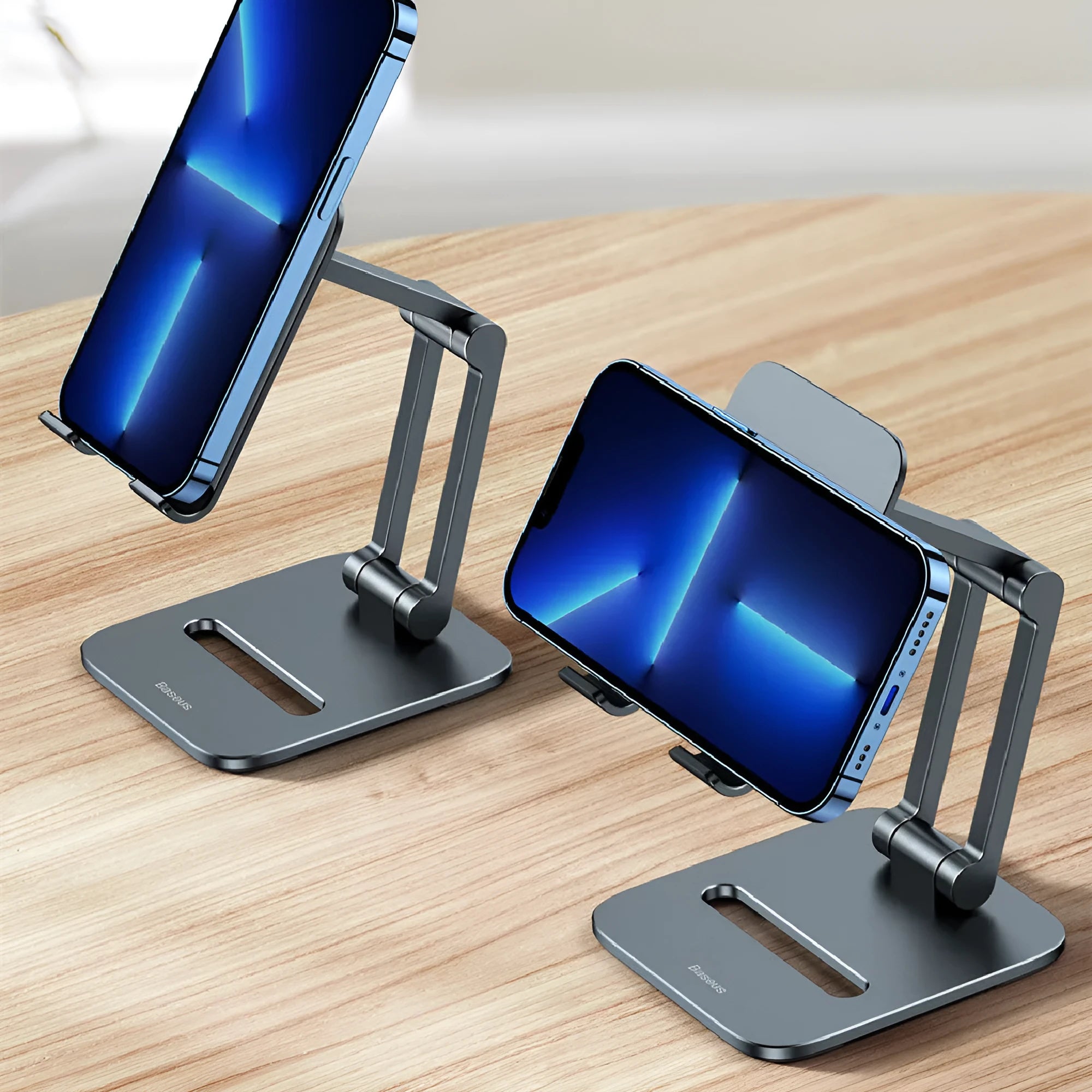 Folding aluminium alloy stand holding a 13-inch tablet on a desk, deep space gray colour, tablet model size 115 by 126 by 43 millimetres