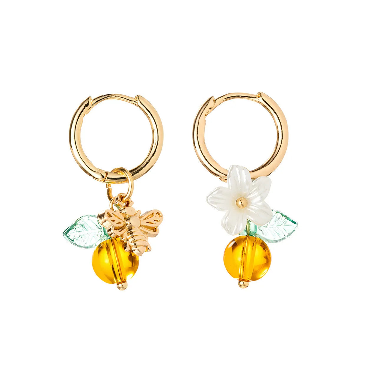 Pair of yellow acrylic sweet bee and honey fruit shaped earrings on a white background