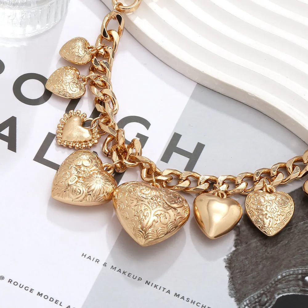 Carved heart pendant necklace in gold or white K with textured surface and exaggerated size