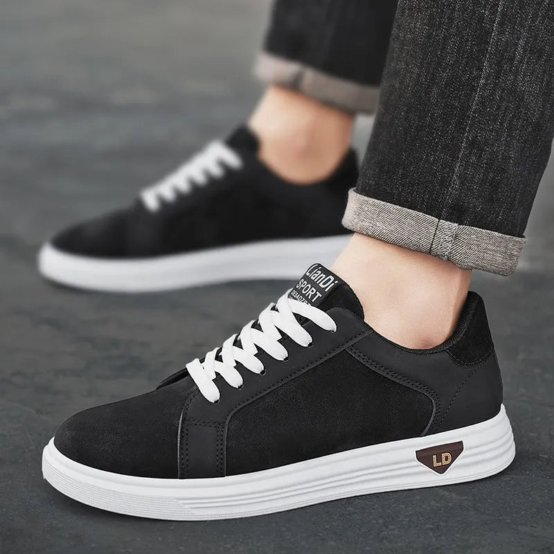 Men's black snake pattern PU leather sneakers with round toe and flat rubber sole.