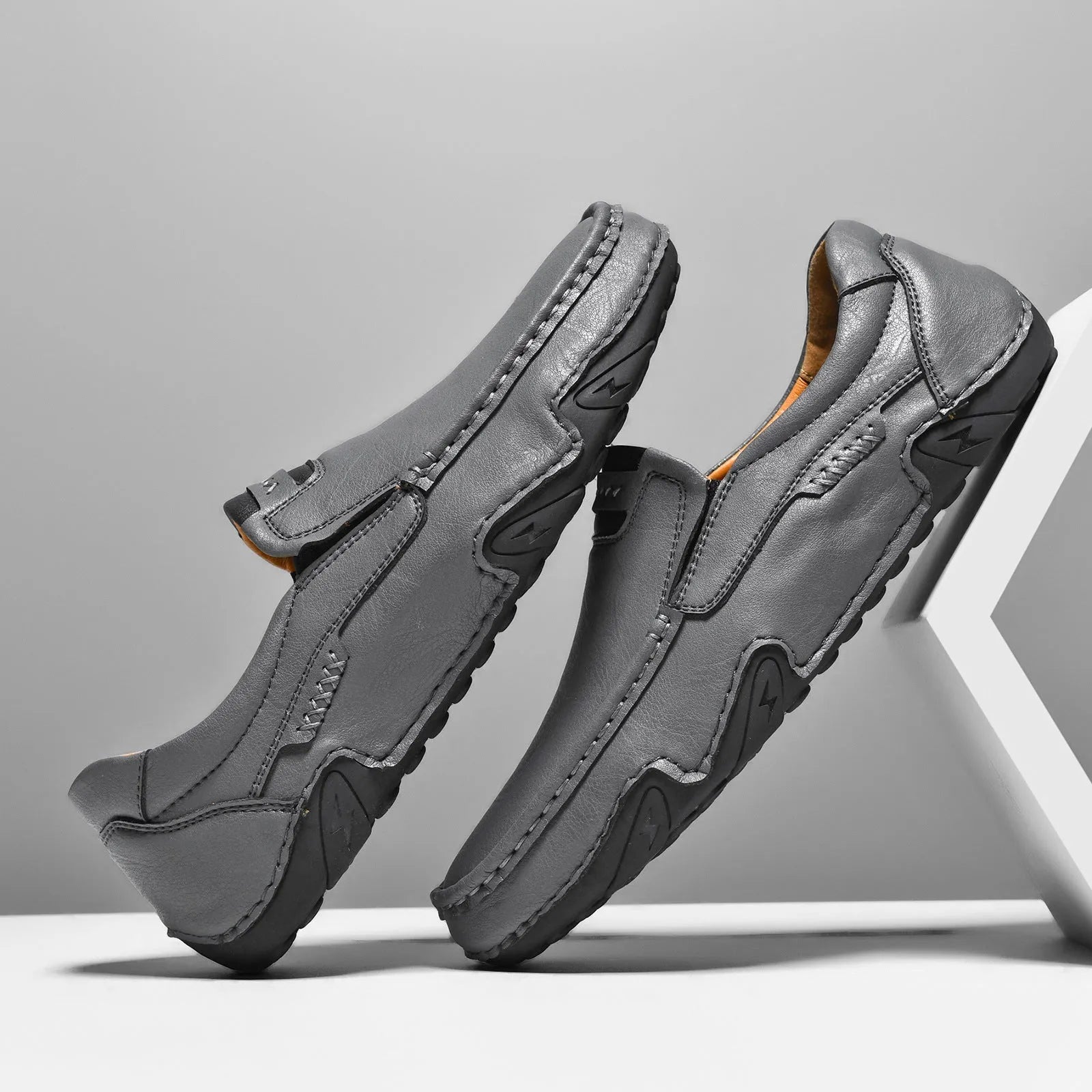 Leather lined slip-on casual shoes with flat rubber sole in multiple colour options