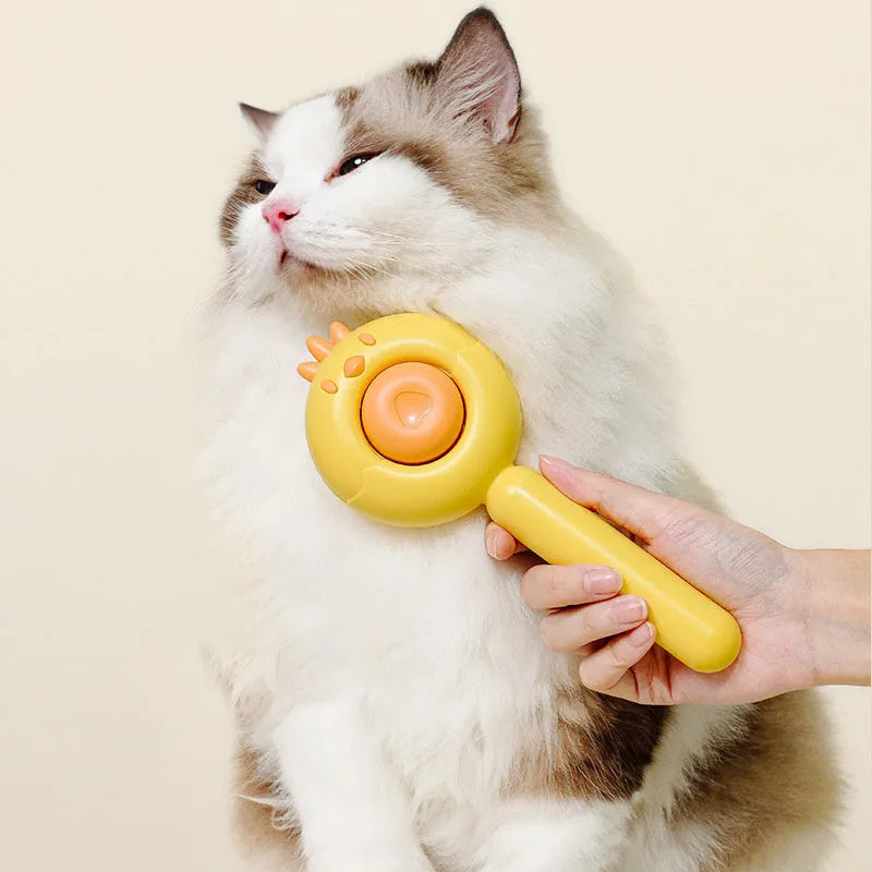 Pet grooming brush with self-cleaning feature and stainless steel bristles for cats and dogs
