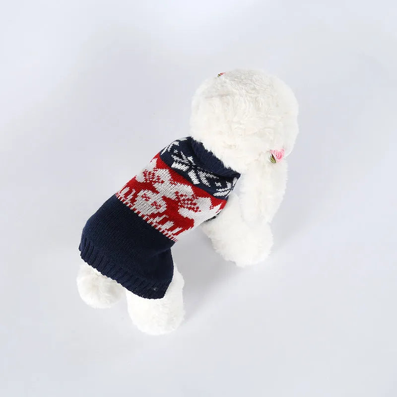 Navy blue knitted Christmas sweater for a dog on a white background.