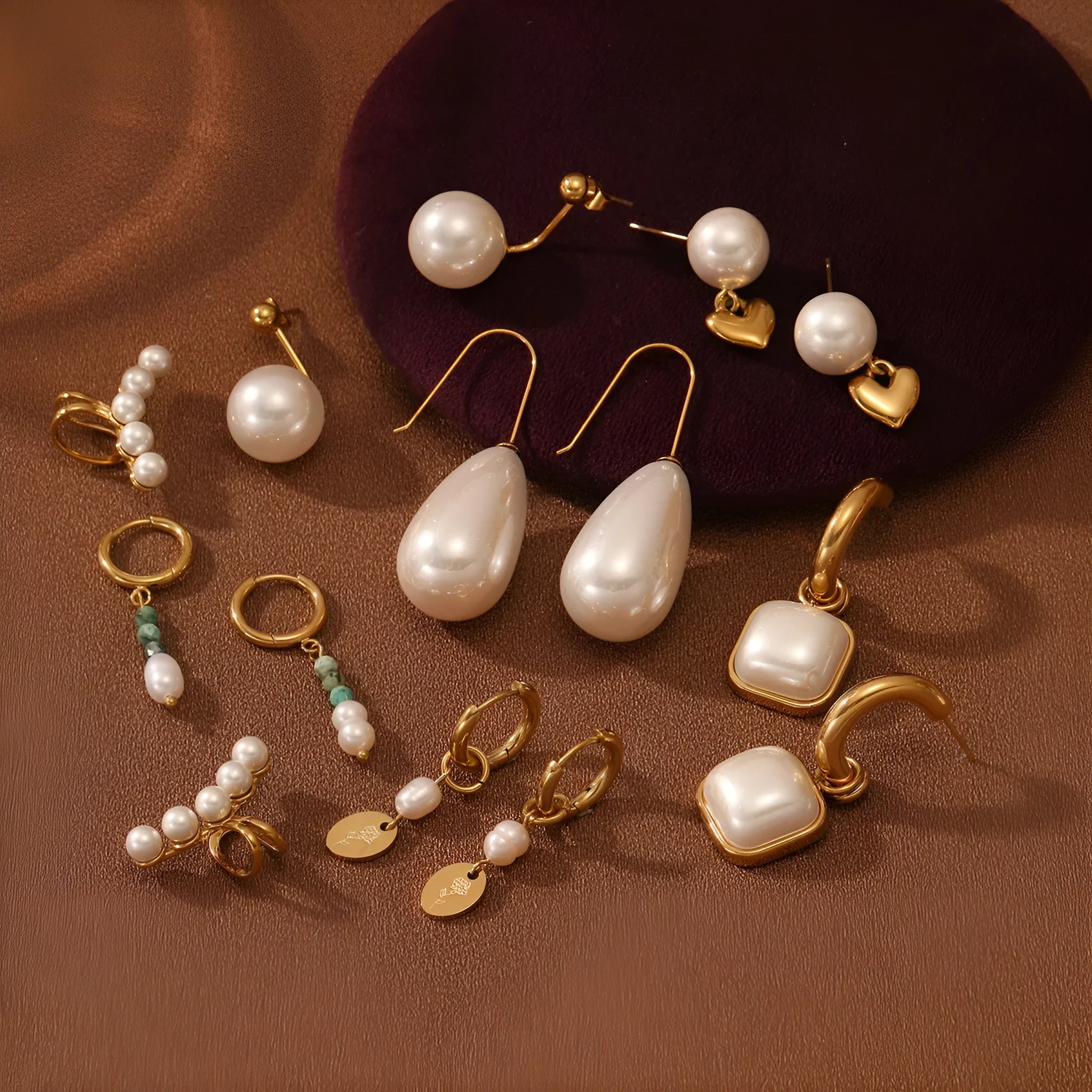 Stainless steel geometric pearl earrings with electroplated finish in NMSE-A7210-1 style