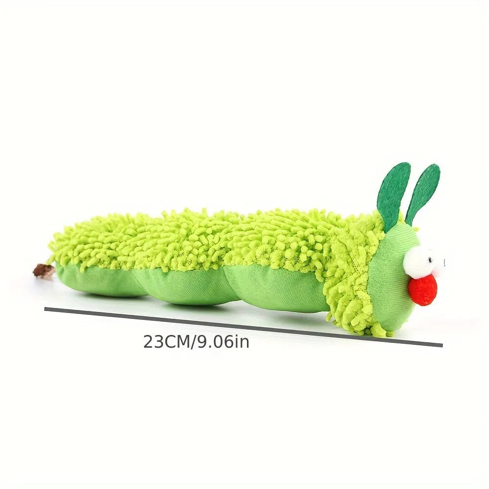 Green interactive plush cat toy pillow on a surface, showing soft fabric and dimensions.
