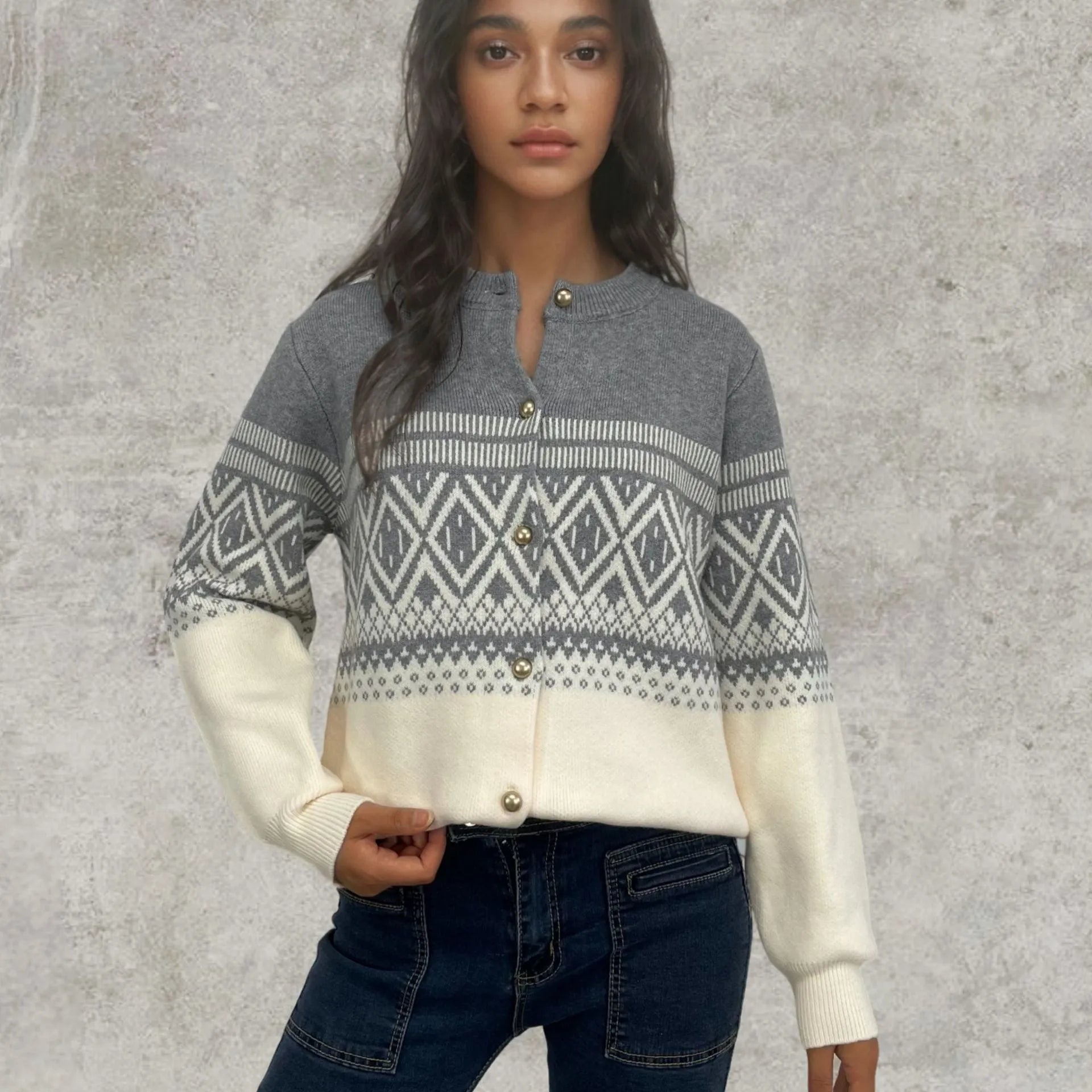 Women's alpaca wool cardigan with contrast colour diamond pattern showing long sleeves and street fashion styling