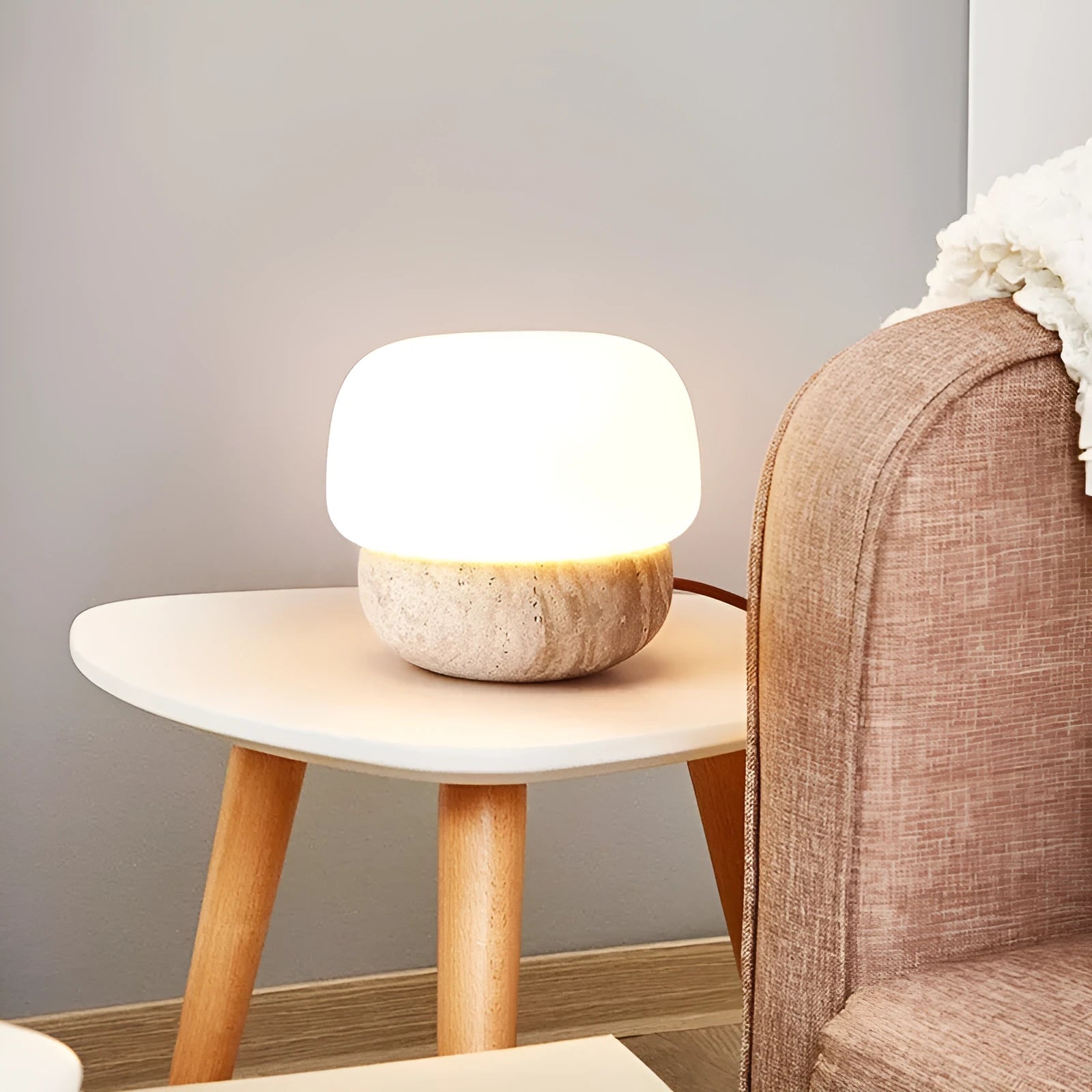 Cream retro bedside lamp with button switch measuring 18cm by 17cm on wooden table