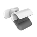 Black gravity car phone holder with 360-degree rotation mounted on a car dashboard.