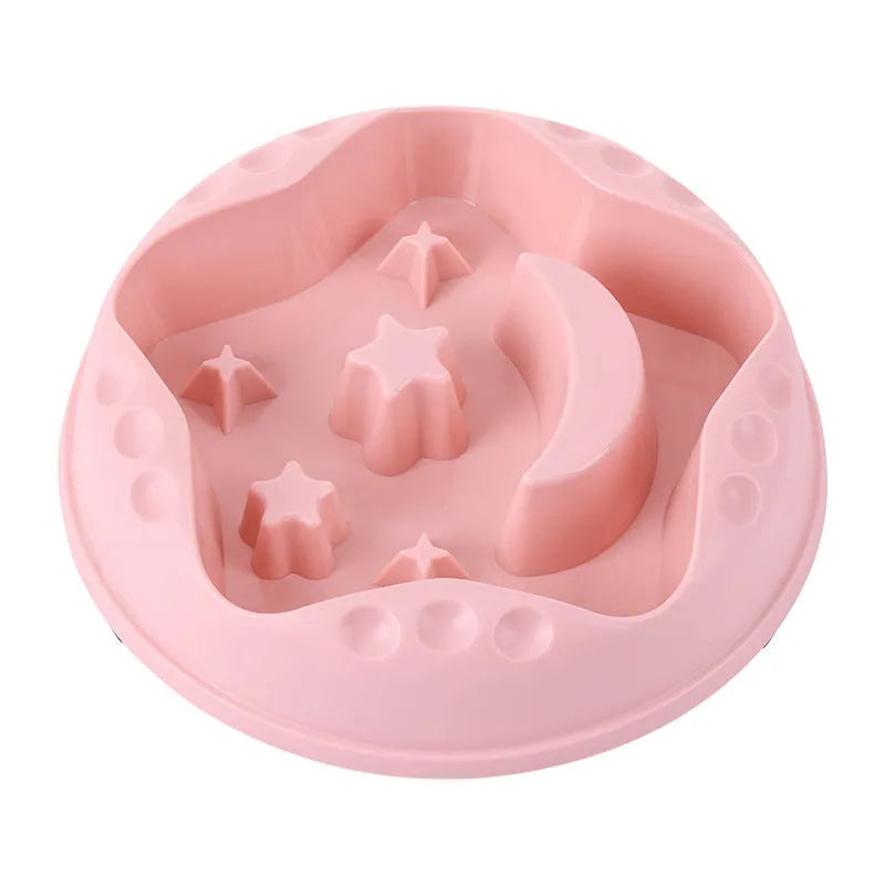 Large blue slow feeder dog bowl with raised moon and star wing patterns and a non-slip rubber base.