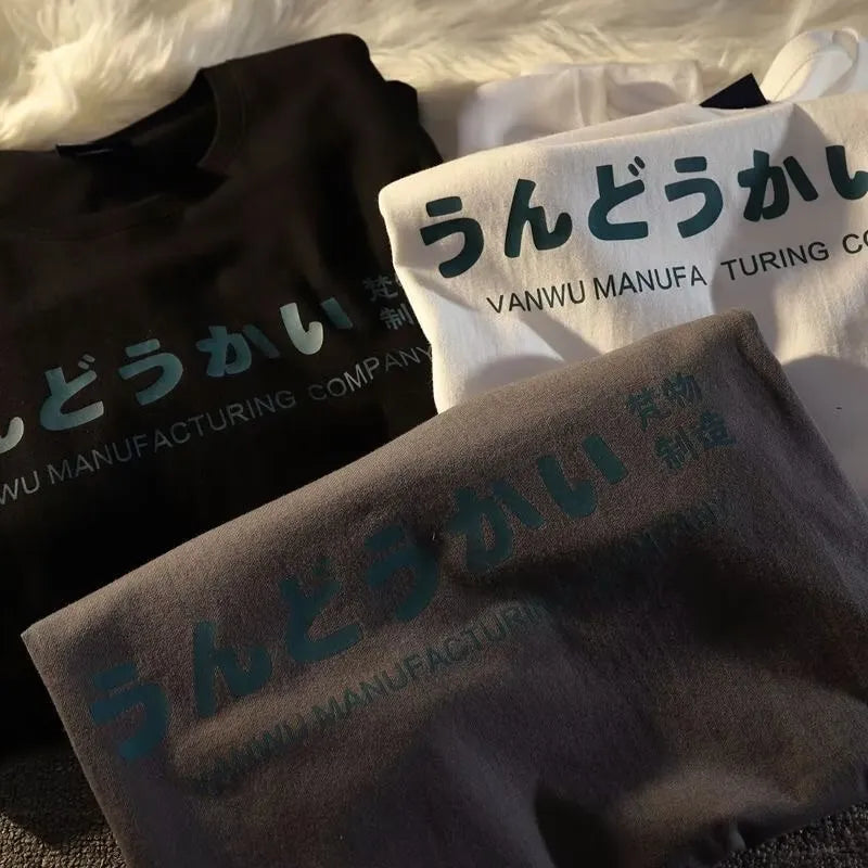 Loose fit cotton short sleeve t-shirt in black, white, and dark grey colours with letter pattern