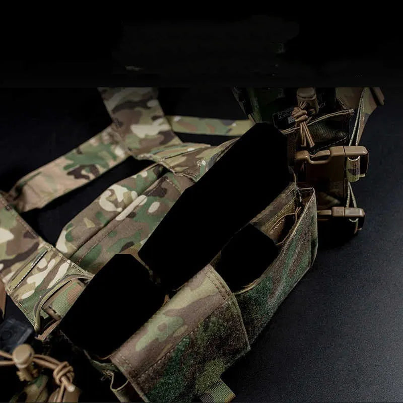 Multifunctional expandable breathable chest mount vest in Cordura fabric, unisex one size fits all, side view with gear pouches