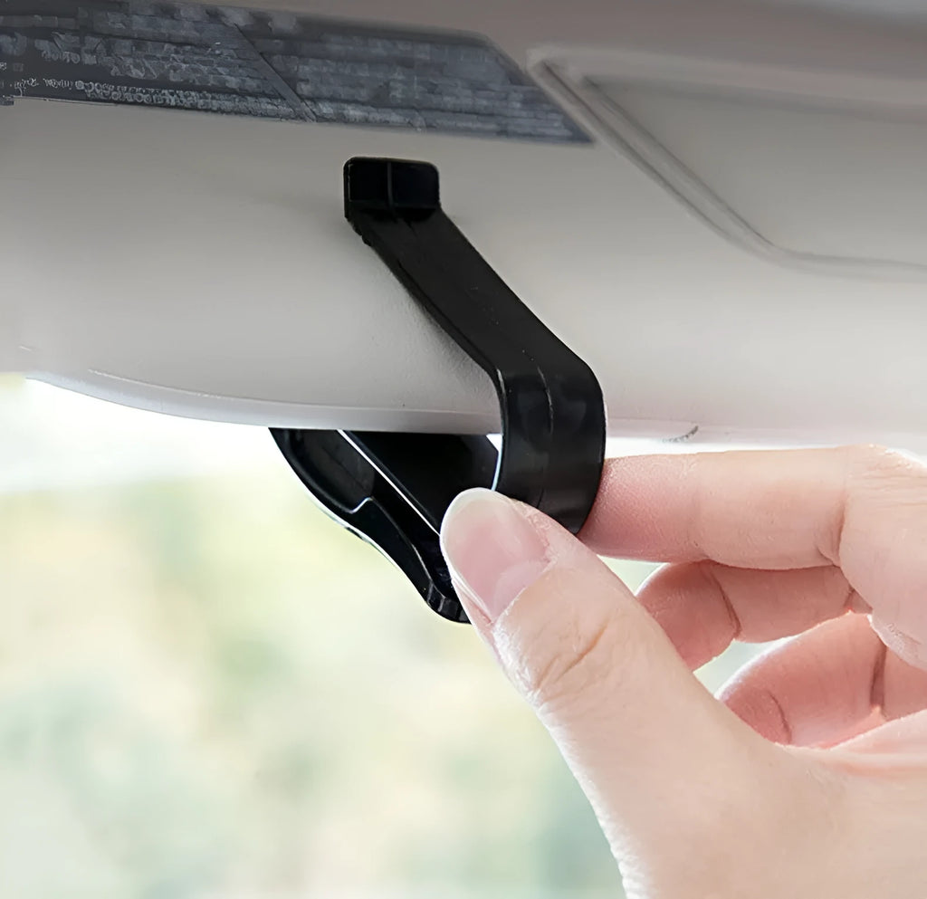 Black plastic clip for mounting sunglasses and cards on a car sun visor