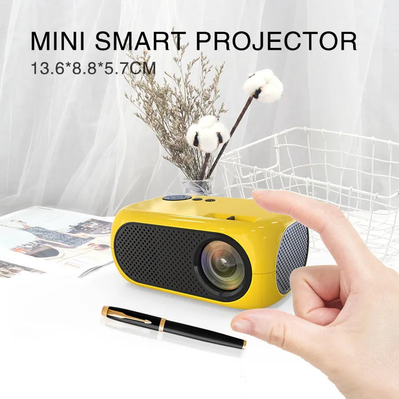 M24 micro mini portable projector showing compact design with gold and white colour options