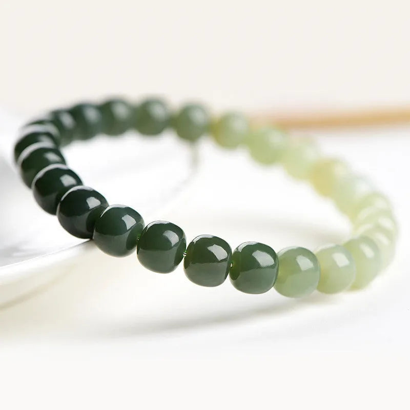 Natural Hetian jade water gradient bracelet with polished beads in clear tones
