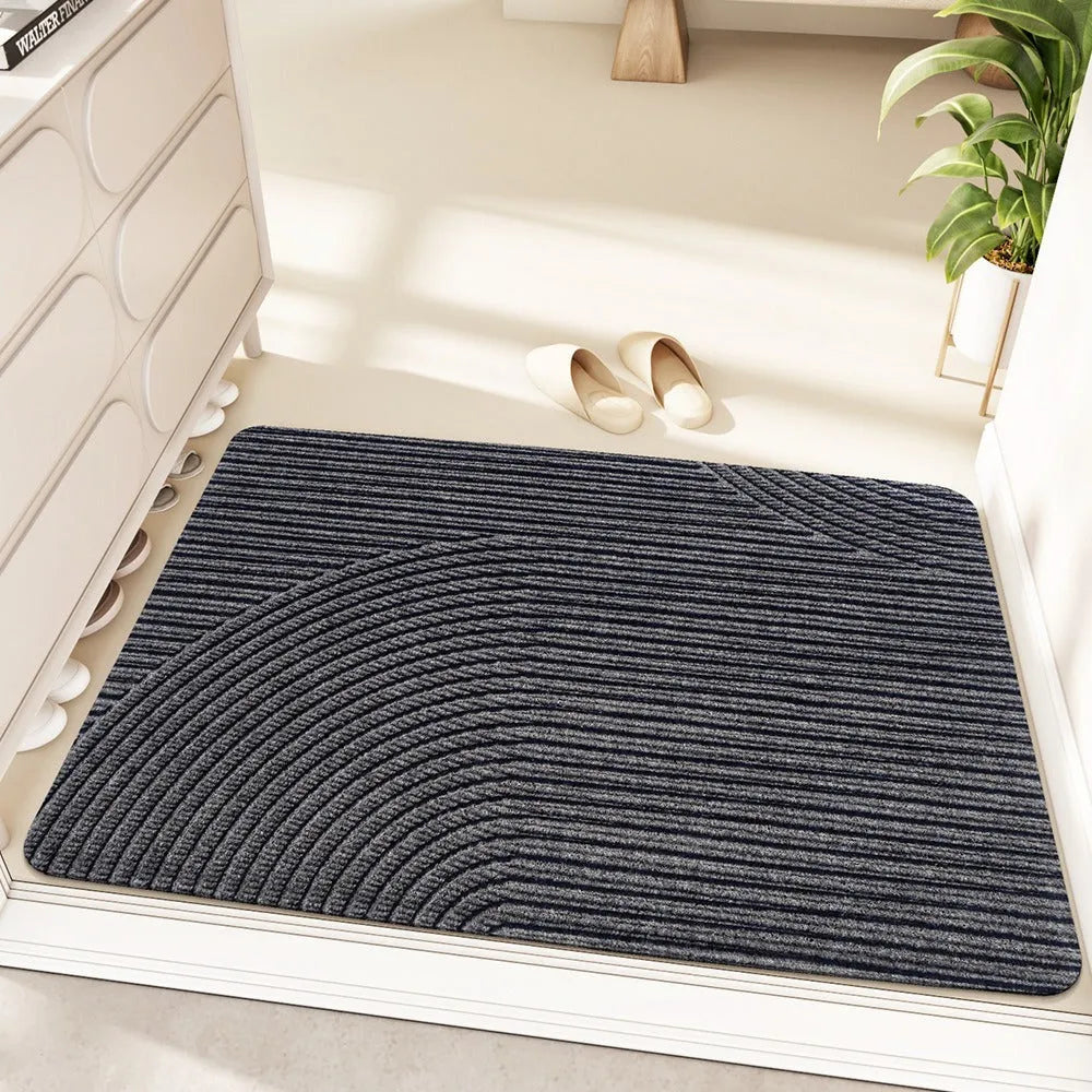 Green diatom oil entrance mat with wire ring frame measuring 60x90cm featuring alien shape and cartoon anime pattern