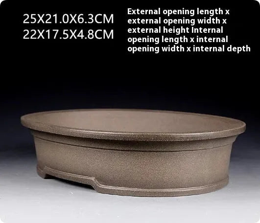 Handmade antique oval purple sand clay bonsai pot showing shallow 6.3cm height profile.