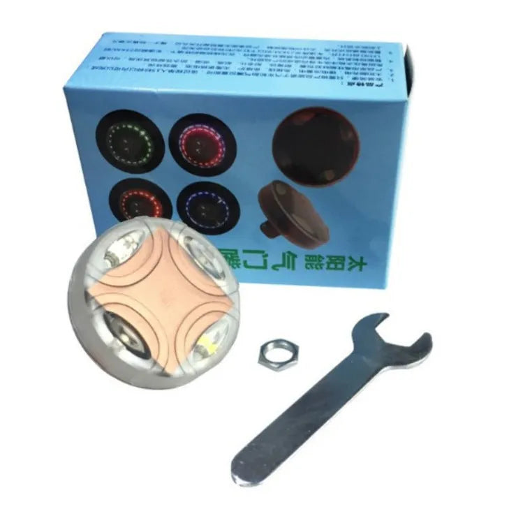 Solar car wheel decoration lights with red, green, and blue LEDs installed on a car wheel hub at night