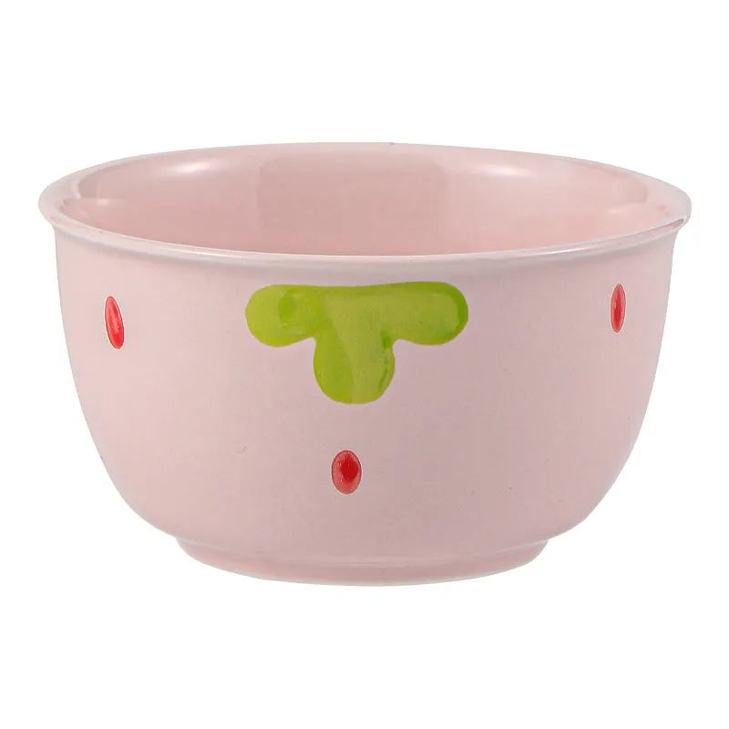 Cute strawberry-themed porcelain dinnerware set with flower bowl, straw hat plate, disc, and twist spoon.
