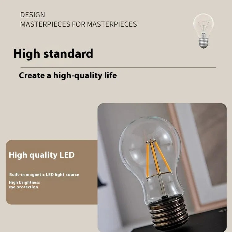 Iron suspension bulb night lamp on black wood grain base for desktop decoration