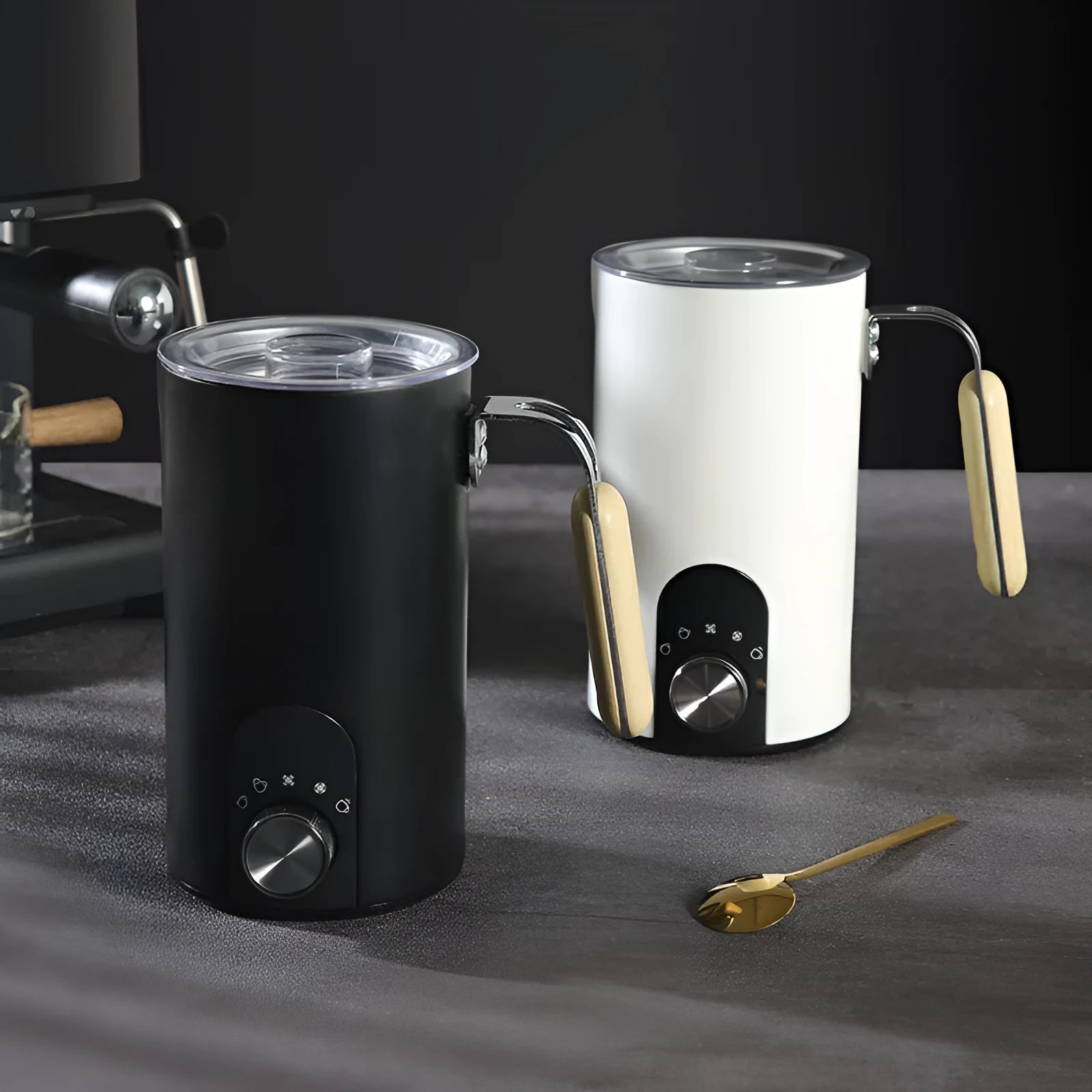 White stainless steel milk frother with knob control and 350ml capacity on a kitchen counter