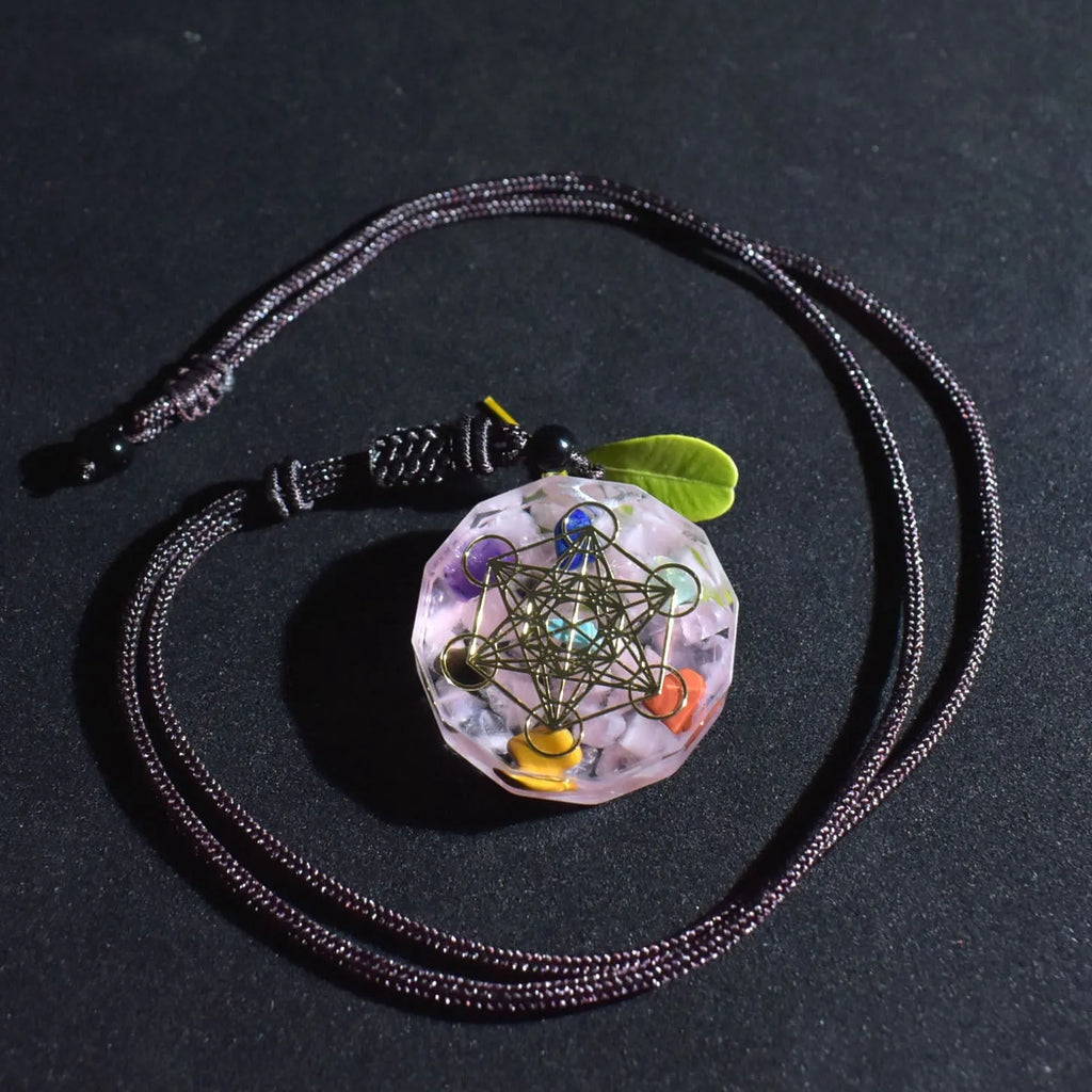Orgonite pendant necklace with multi-colour crystal chips, resin metal matrix, and quartz crystals for chakra energy balancing