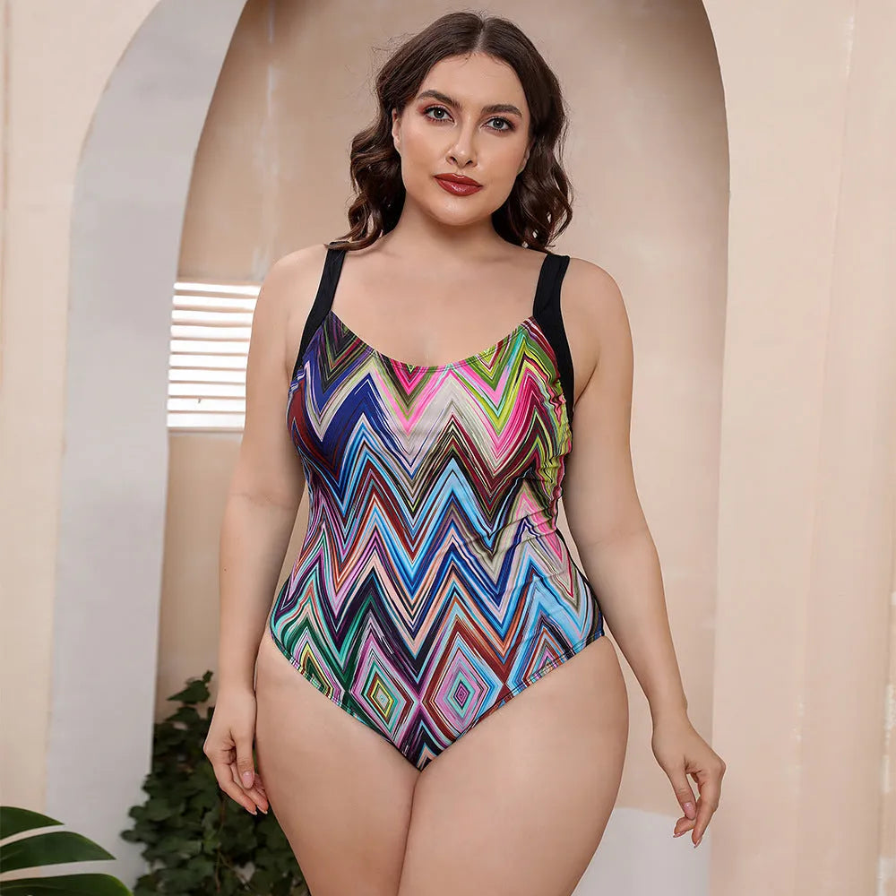 Conservative one-piece swimsuit with spaghetti straps and floral print pattern for swimming