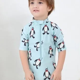 Boys' penguin print polyester swimsuit set with matching swimming cap for sun protection