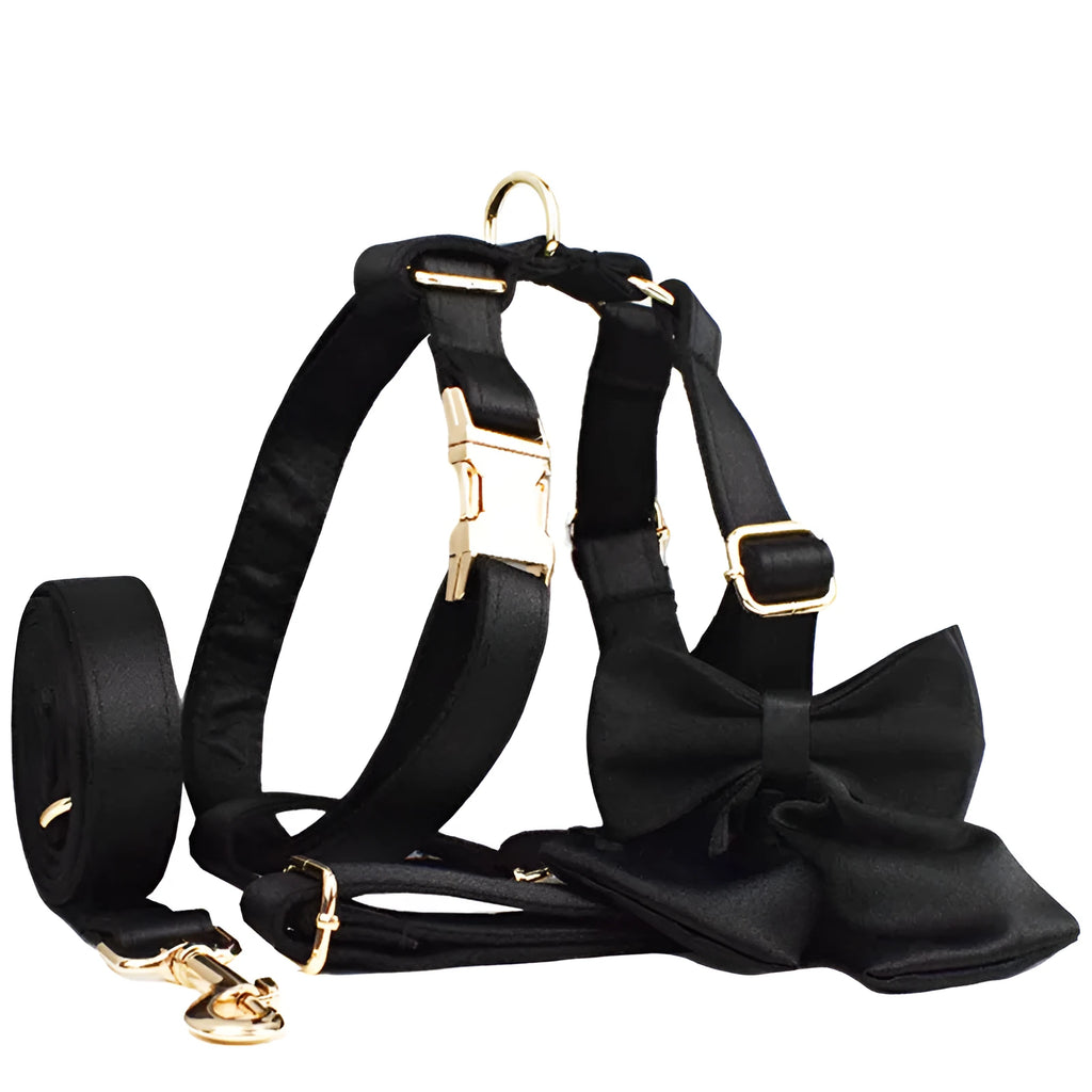 Cloth dog collar and leash set with matching decorative bow and dog vest in various sizes