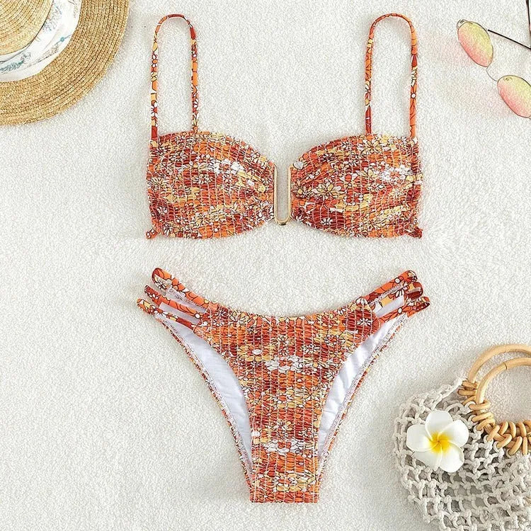Women's floral bikini swimsuit with high-waist design in blue colour