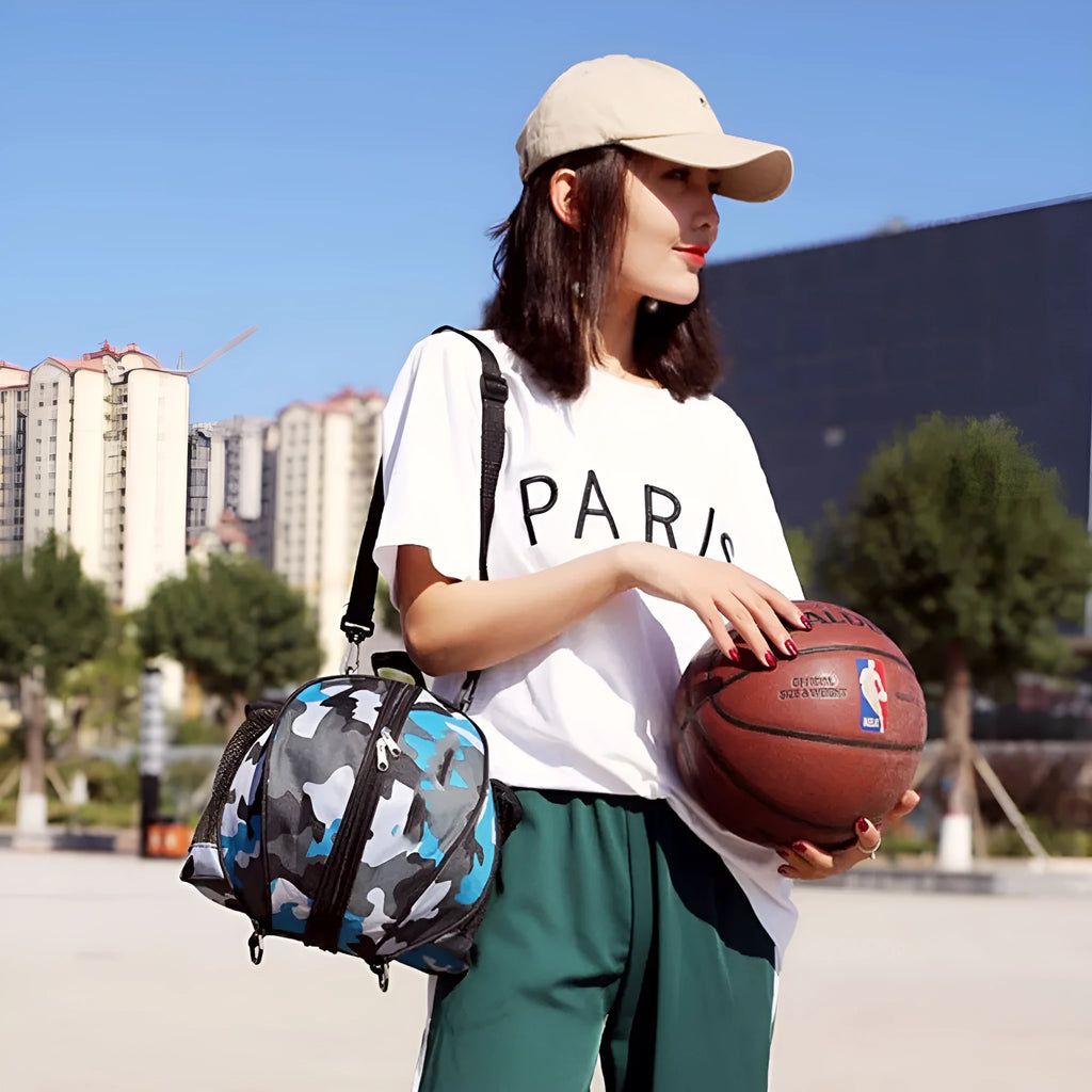 Oxford cloth basketball training bag with 9-litre capacity, shown in a choice of colours and one or two shoulder straps.