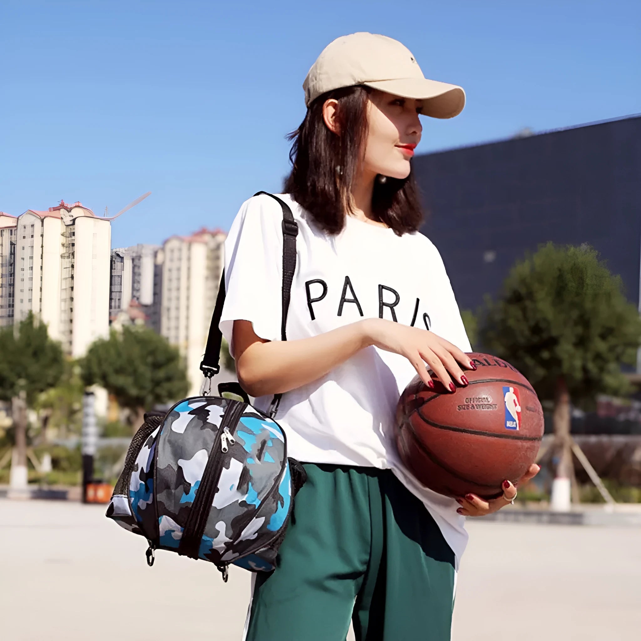 Oxford cloth basketball training bag with 9-litre capacity, shown in a choice of colours and one or two shoulder straps.