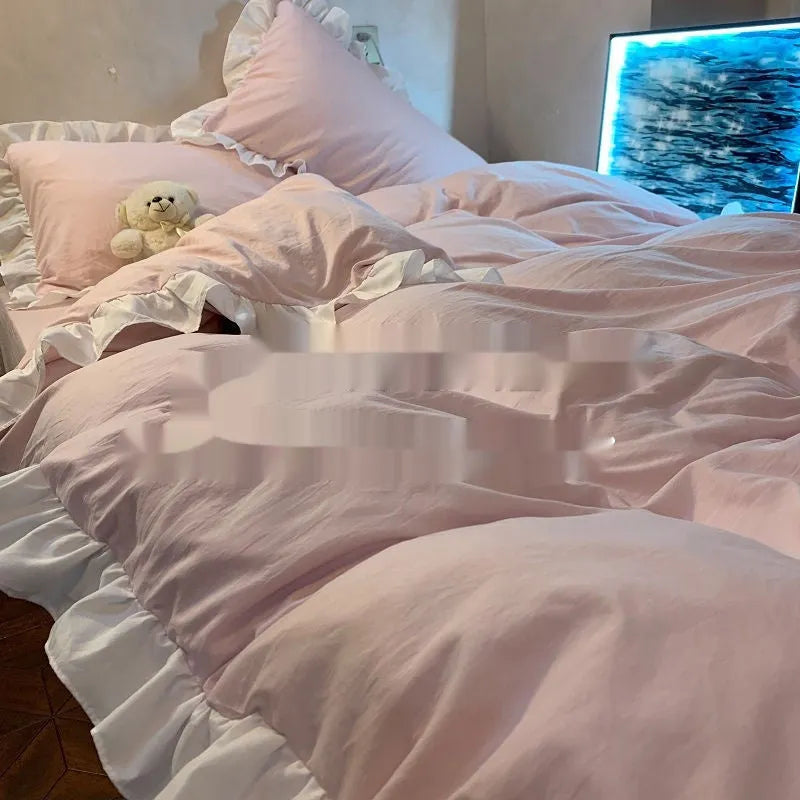 Mori style washed cotton four-piece bedding set in solid colour on a bed