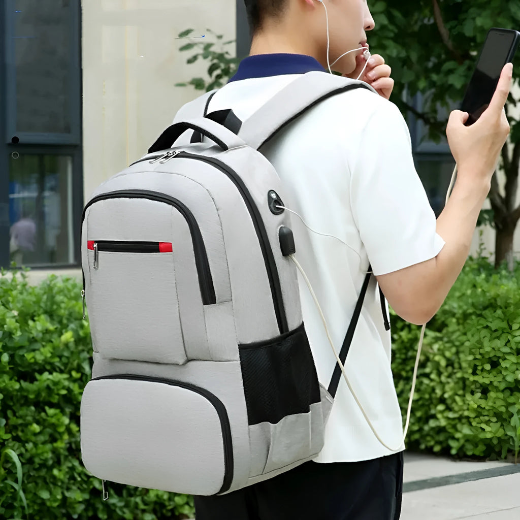 Light grey insulated Oxford cloth backpack with curved shoulder straps, showing dry wet separation compartments.