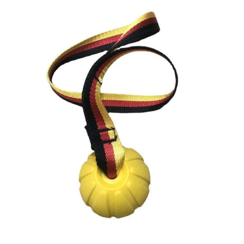 Yellow and camouflage coloured EVA floating dog balls with strings in 6.5cm, 7cm, and 9cm sizes.