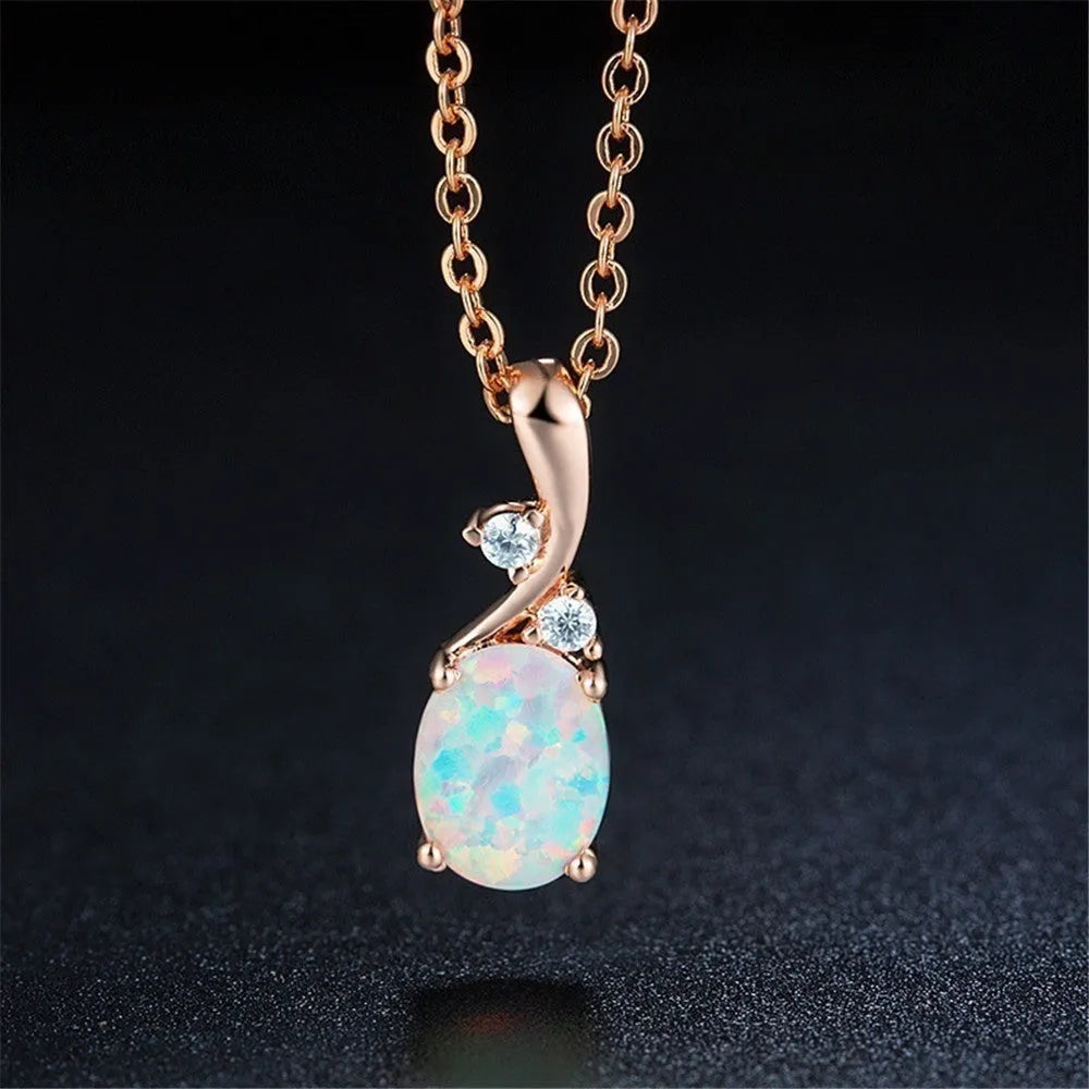Water drop shaped opal pendant necklace with adjustable chain in rose gold or white finish