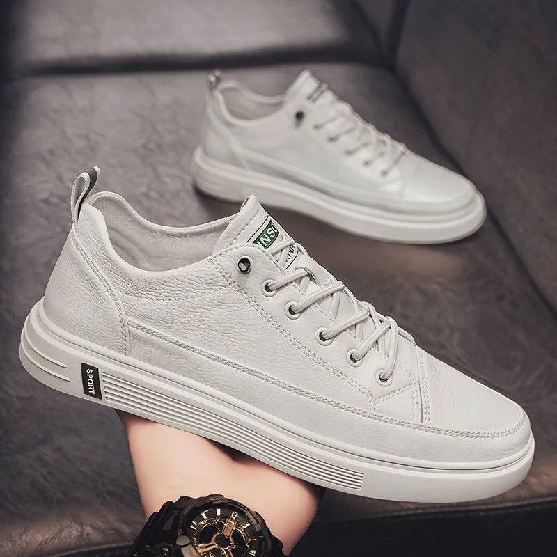 Men's white casual PU shoes with round toe and low heel on beige background