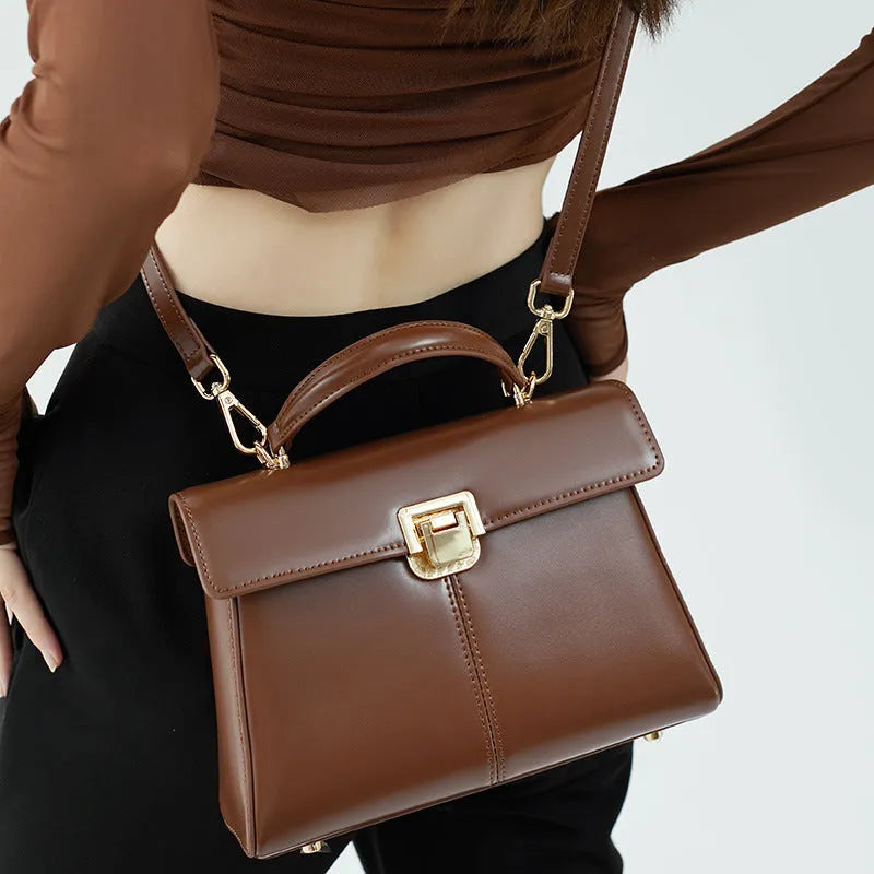 Women's genuine leather shoulder bag in horizontal square design with cover opening