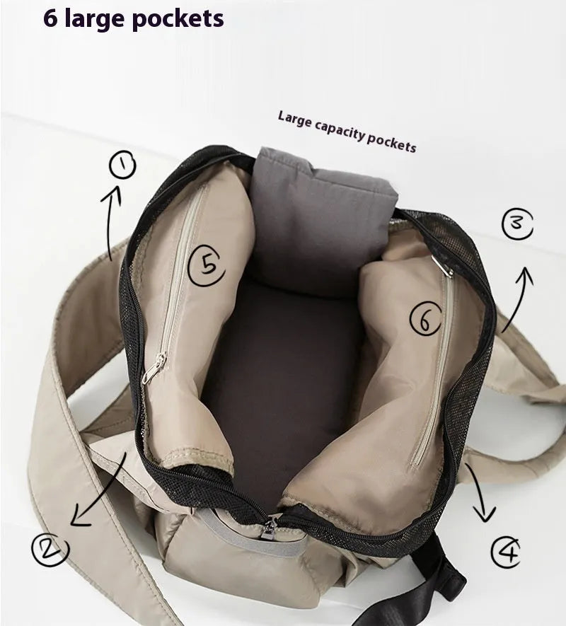 Apricot-coloured cloth pet carrier handbag for outdoor use with small pets.