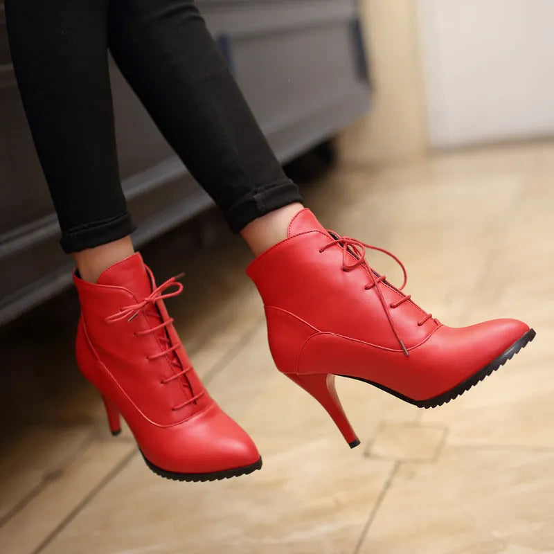 Women's lace-up Martin boots with stiletto heel in black, brown, and red