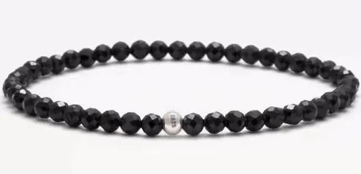 Unisex bracelet with black obsidian, blue San, and agate beads in round and square geometric shapes.