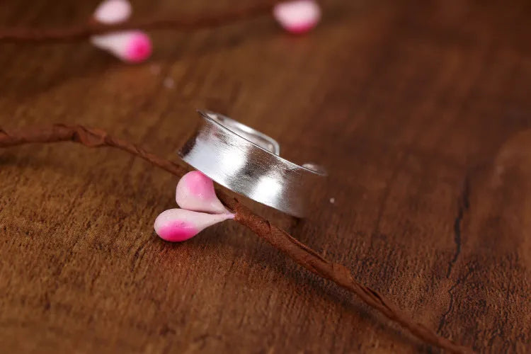 Adjustable open ring with geometric shape in frosted sterling silver with electroplated finish