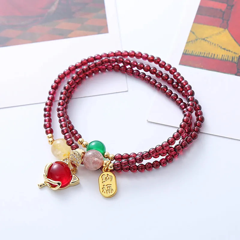 Purplish red garnet fox bracelet with adjustable rope tie for women